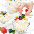 ice cream is decorated with blueberries